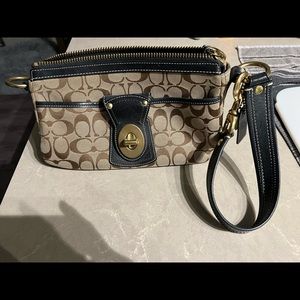 Coach bag with wristlet strap